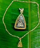 Gold chain with small Buddha pendant